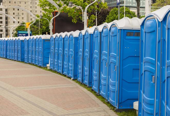 a row of portable restrooms at a fairground, offering visitors a clean and hassle-free experience in gastonia